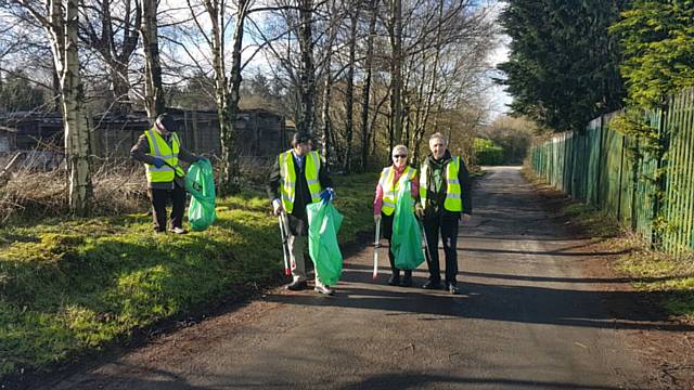 Castleton Councillors Billy Sheerin and Aasim Rashid took part in street litter picking