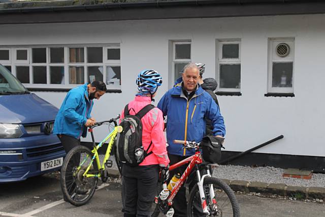 Councillor Daalat Ali gets ready to cycle 