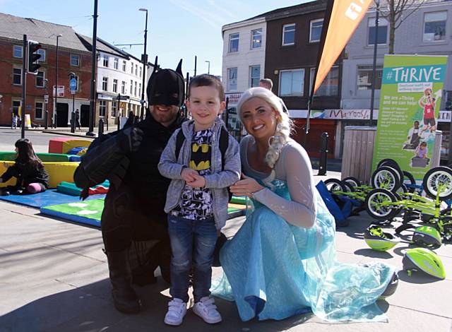 Elsa and Batman celebrate the launch of the borough’s new Thrive service