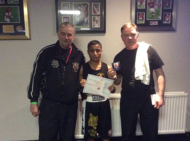 Shahruf Ali, North West Region, 44KG Open Class Junior Champion, with his coaches