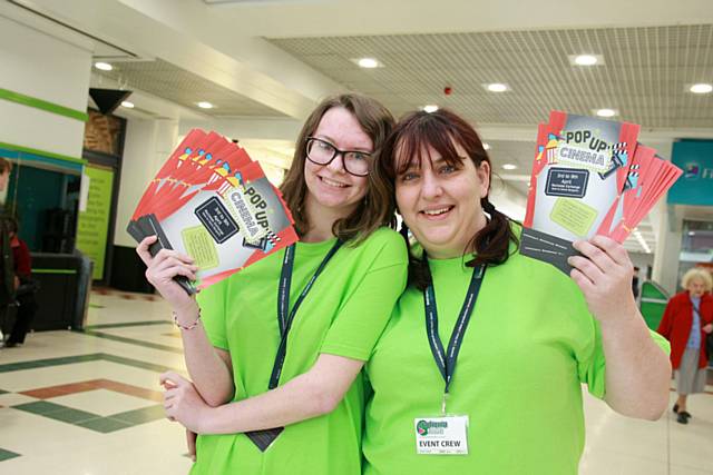 Amber Kelly and Helen Moule promoting Rochdale Exchange’s pop-up cinema on the mall