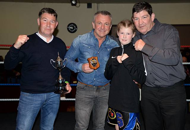 Darren Connellan, Brian Kelly, Allana Shaw and Tony Connellan presenting the Johnny Butterworth Cup for most improved