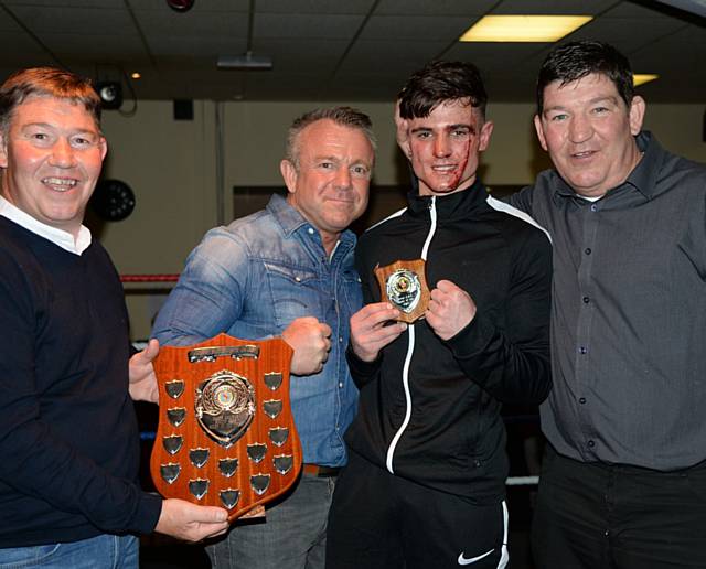 Darren Connellan, Brian Kelly, Harry Bills and Tony Connellan presenting the Johnny Butterwoth Shield for Boxer of the night