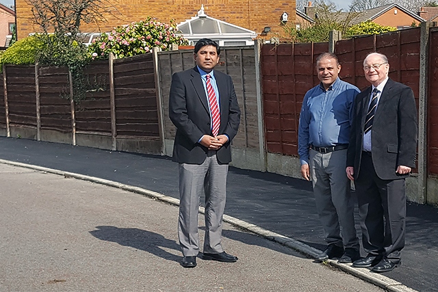 Councillor Aasim Rashid, Mohammed Arshad and Councillor Billy Sheerin at the new footpath on Chevron Close