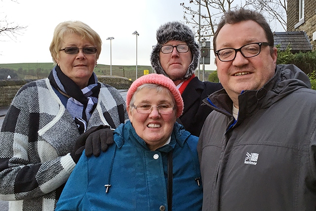 Councillors Andy Kelly and Irene Davidson with local pensioners in Newhey