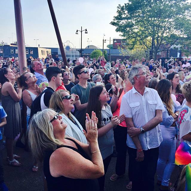 Cllr June West and the crowd at the vigil