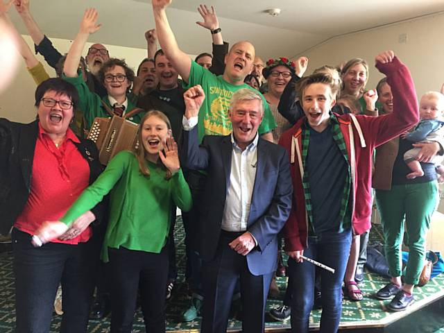 Tony Lloyd celebrates his election win with the Oakenhoof Cloggers