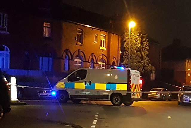 Police cordon Ashfield Road after two men stabbed