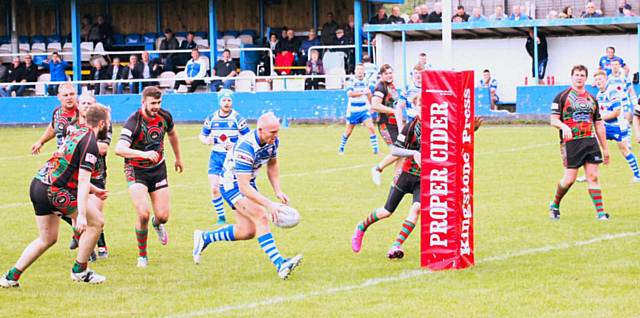 Callum Marriott going in for a try