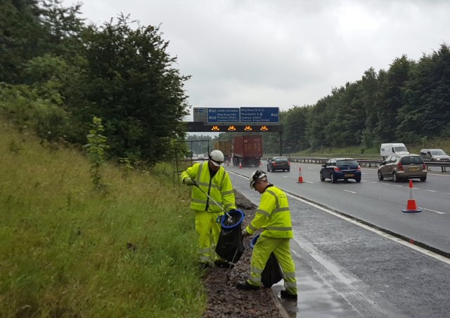 Litter picking taking place on the motorway