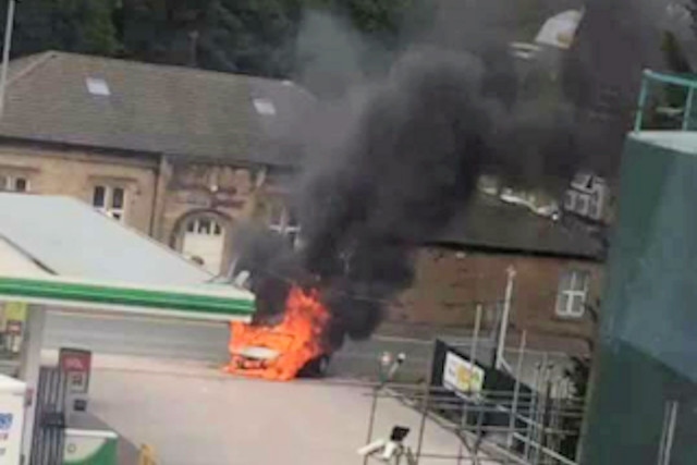 The car burst into flames at BP petrol station on Bury New Road in Heywood