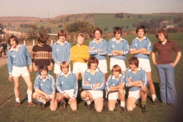 Michael (front centre) with his football team 