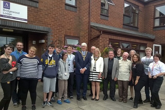 The Mayor and Mayoress of Rochdale Ian and Christine Duckworth at Bridge Wood Lodge with apprentices and staff