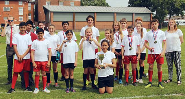 Beech House School Sport Day senior winners: Saturn's House with Captain Maya Servio