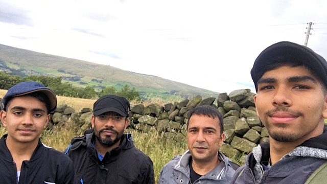 Saqlain Khalid, Zulf and Dan Ahmed, and Asif Nazir (pictured) are taking on the tallest mountains in Great Britain in just 24 hours.