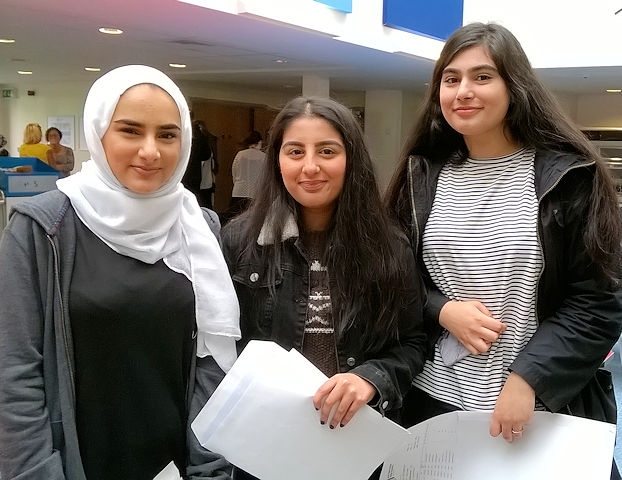 Ruda Isamil, Ammum Aamir, Sania Irshad at Matthew Moss High School celebrating their results 