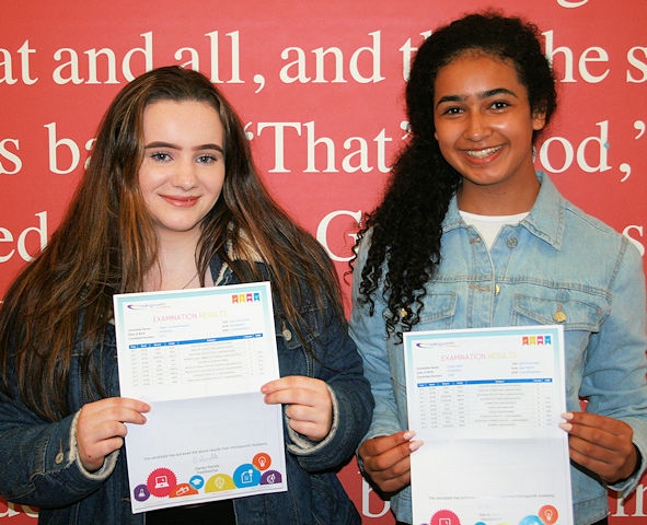 Tiegan Waldron-Crombie and Chloe Caton with her results at Hollingworth Academy