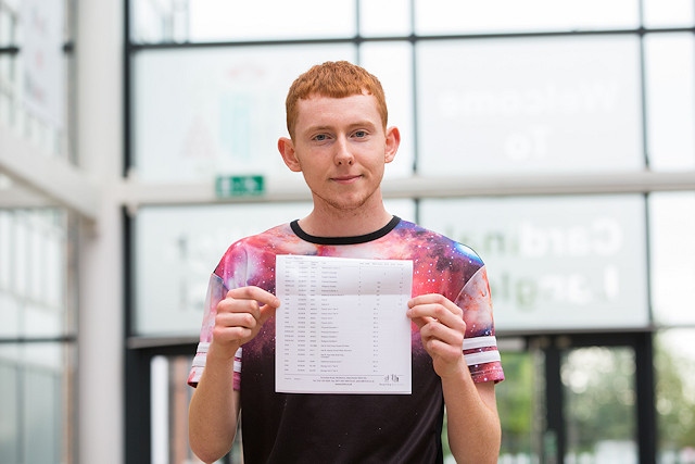 Matthew Hadcroft at Cardinal Langley RC High School celebrating his results