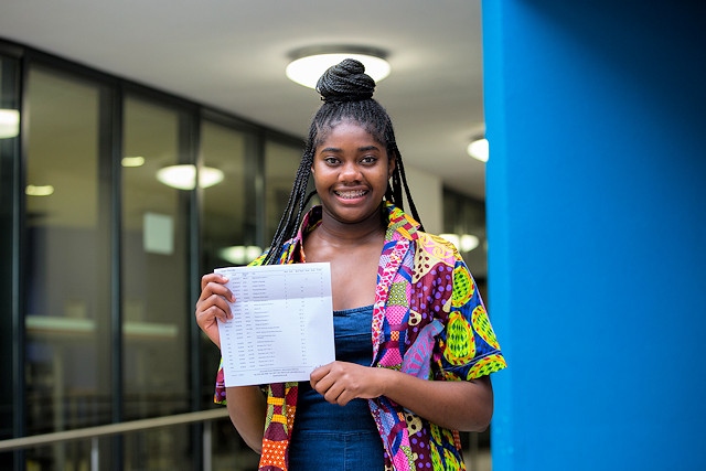 Vanessa Luamba at Cardinal Langley RC High School celebrating her results