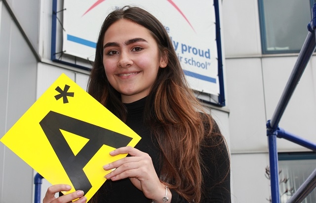 Natalie Jeppeson celebrates her results at Whitworth Community High School