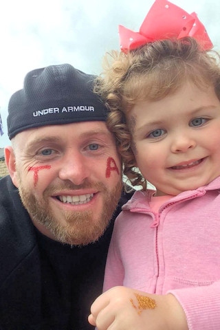 Wayne Traynor with his youngest daughter, Eydi, were part of the group walking to Littleborough.