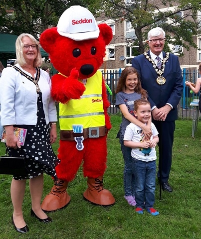 Mayor and Mayoress, Ian and Christine Duckworth with Seddy Teddy and children from Lower Falinge Activity Group 