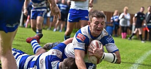 Jack Sampson scores the first of his two tries