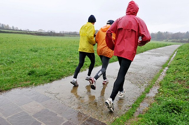 Runners in rain