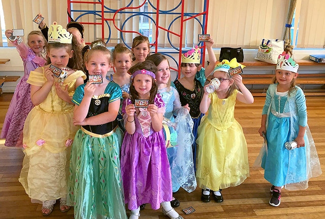 St Margaret’s Rainbows receiving their badge at the Princess Party