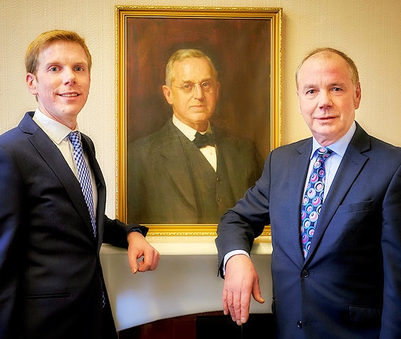 James Taylor and Peter Taylor beside a painting of Peter’s grandfather in our office