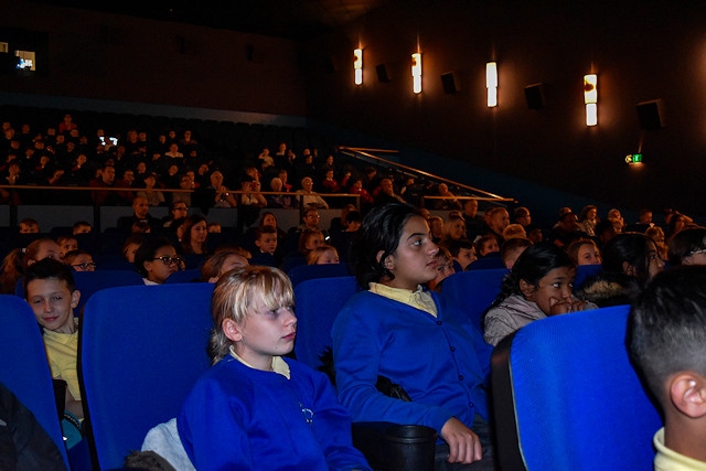 The children watch their film