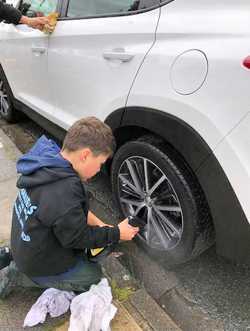 Clean as a whistle: Nathaniel ensures each car looks perfect