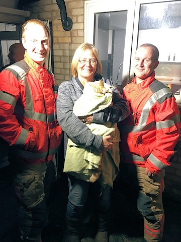 Heywood Community Fire crew with Simba the cat 