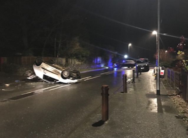 An overturned car at Dean Head