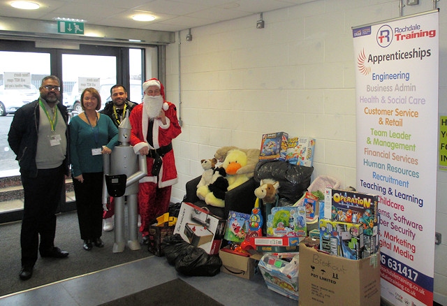 Rochdale Training’s CEO Jill Nagy and ‘Father Christmas’ were proud to present toys to Rochdale Community Partnership