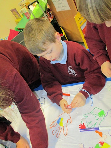 Leo helping to make the Eucharist Table cloth