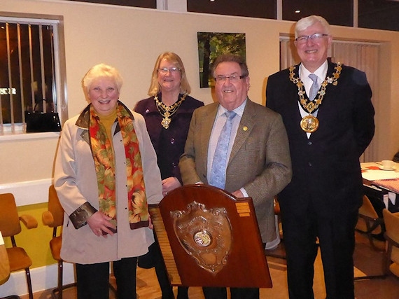 Councillor Peter Rush collects the award on behalf of Back o'th Moss Community Centre for the best walking entry into the parade.