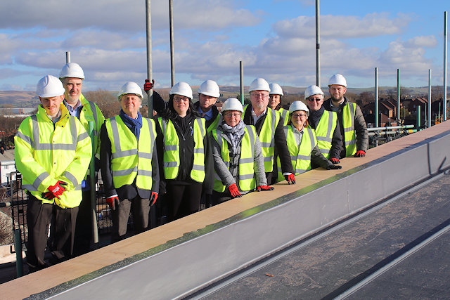 Guests at the topping-out ceremony on The Strand