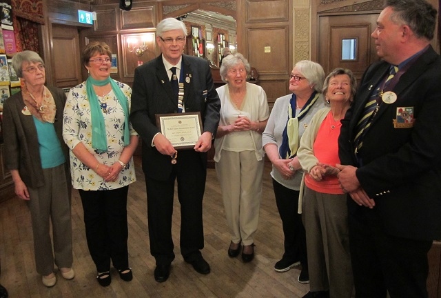 Heywood Lions President Steve Brown receiving Bert Mason Humanitarian Award