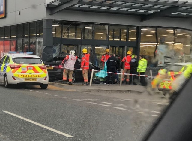 Car smashes into Aldi store