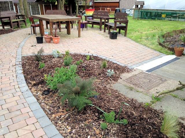 Middleton Rotary Club create a garden at Alkrington Community Centre