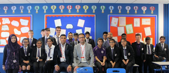 Boxer Muhammad Ali Zahid and his manager Asad Shamim visit Falinge Park High School 