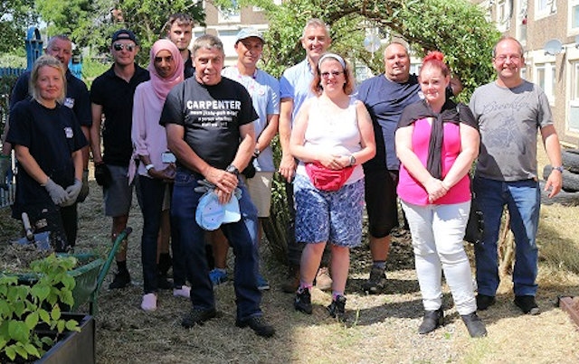 RBH employees and local residents at the Lower Falinge Community Garden