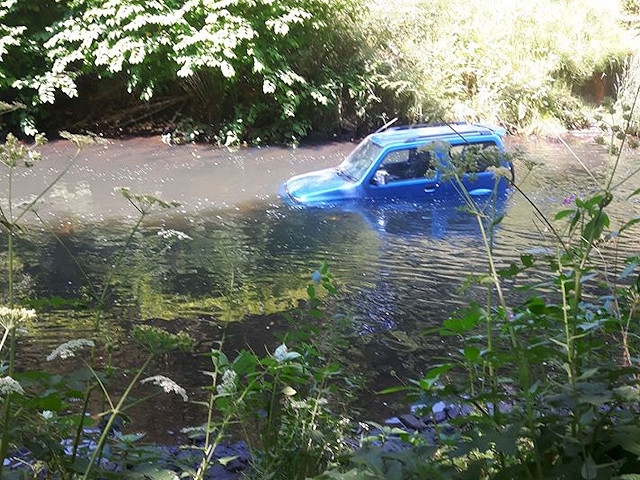 Car abandoned in Heywood river