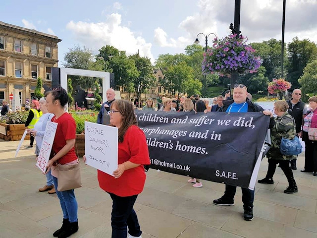 Survivors First outside the Town Hall