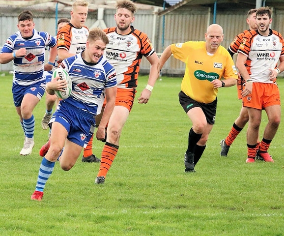 Corey Newsham shows his delight after a 90m sprint