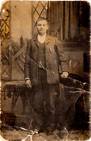 Charles Wilson pictured with a pocketwatch he received on his 14th birthday. Date unknown