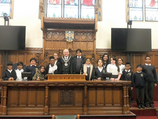 Broadfield Primary School students in Rochdale Town Hall's Council Chambers