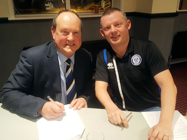 Rochdale AFC Chief Executive David Bottomley and Trust Chairman Col Cavanah signing the MOU