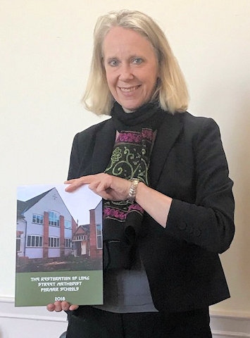 Liz McInnes MP for Heywood and Middleton with the booklet about the restored Long Street Methodist Church and school rooms, Middleton 